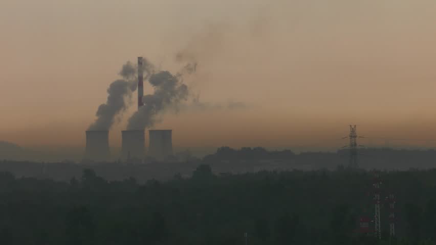 Power plant block. Water vapor rises to the sky. Energy poles and chimneys in the background. Sunrise and fog. 4K. Closeup Royalty-Free Stock Footage #1011436586