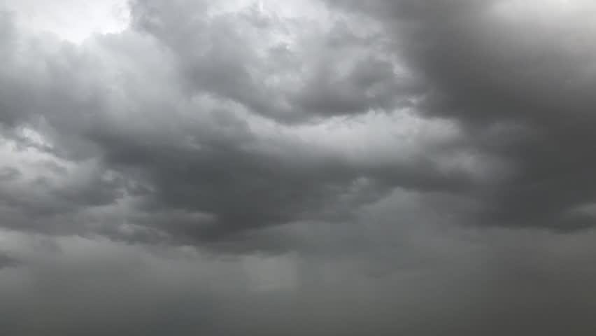 Storm clouds Time lapse supercell dark storm Swirling clouds moving fast Electrical viewer thunderstorm cloud Hurricane landfall winds, storm HUGE flooding along Lightning Strikes Rain Drops Falling Royalty-Free Stock Footage #1011439841