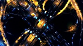 Aerial view of traffic on highway at night.