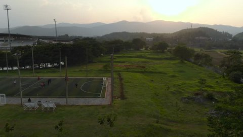 Outdoor futsal, soccer court with players at both team in public university