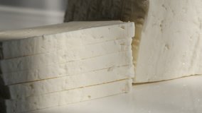 Semi-hard cow milk cheese 4K close-up footage