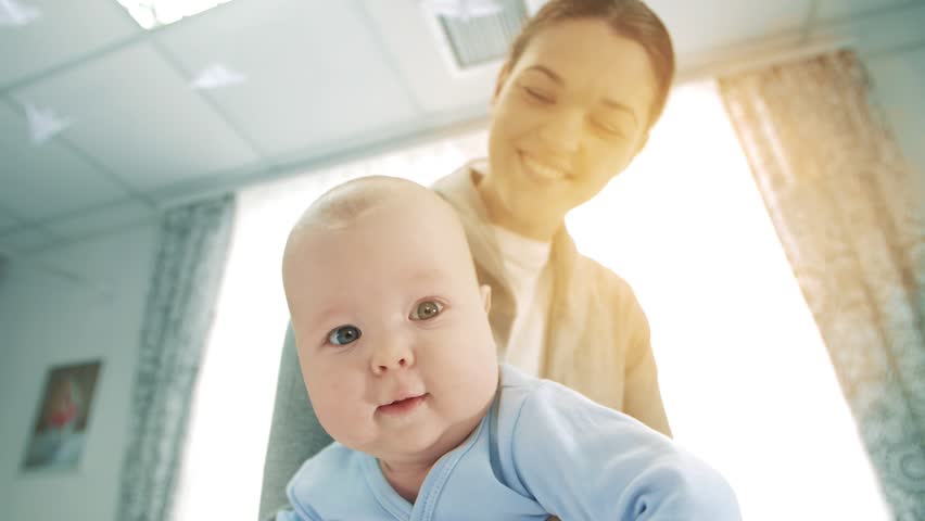 mother-feeding-baby-food-eating-on-stock-footage-video-100-royalty