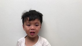 Closeup portrait of sad Boy Crying Bitterly.4K Video.