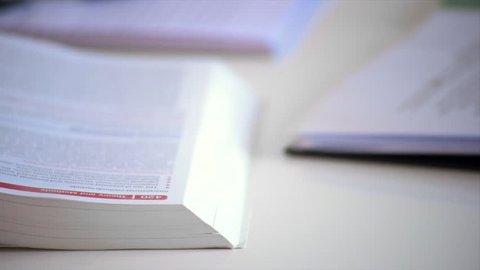 Close up tilt of revision books