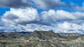 Timelapse Almeria West dessert Tabernas,   Clouds moving along a western city background.
Love this unbelievable west Andalusian  landscape.