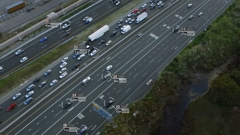 Highway aerial view with fake car speed, plate number, driver information and ID. Perfect to illustrate concepts as: surveillance, big data, traffic control, futuristic cities. Future transportation. 