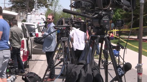 MIssissauga, Ontario, Canada May 2018 Broadcast news media television cameras at police crime scene
