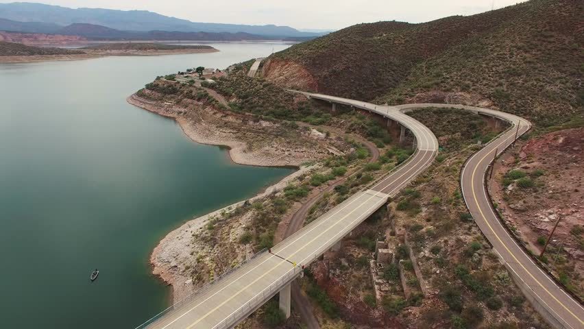 Panoramic view of Roosevelt Lake and highway nearby, Arizona, USA 