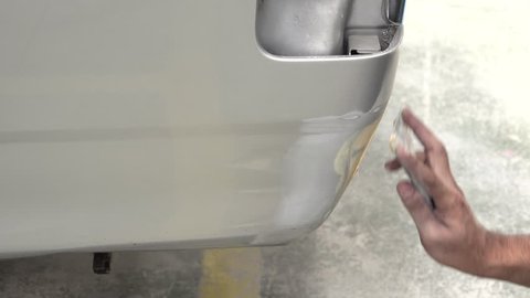 4K Garage Car body work car auto car repair car paint after the accident during the spraying automotive.