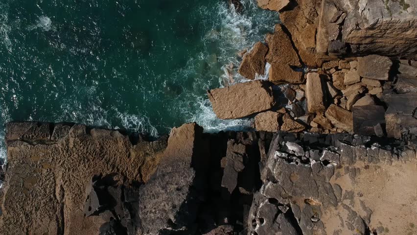 Aerial view of ocean waves and fantastic Rocky coast