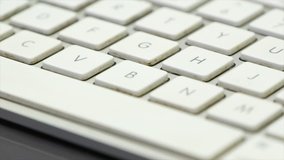 Close up view of keypads of a white keyboard