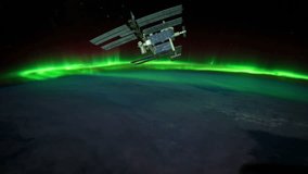 Space station and the Northern Lights over the Earth.  4k UHD.
Video courtesy of the Earth Science and Remote Sensing Unit, NASA Johnson Space Center.