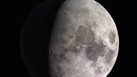 The surface of the Earth's Moon: close-up to a detail full of shadows, then the camera zooms out to show a wider view of the terrain. Elements of this image furnished by NASA