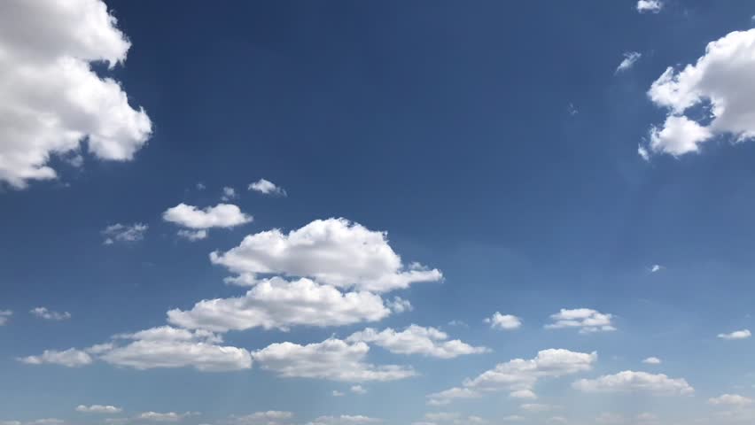 Cumulus clouds form against brilliant blue sky growth Blue sky and Seamless clouds Time lapse nature rolling puffy cloud oxygen moving Time lapse white clouds Puffy fluffy blue sky in background art Royalty-Free Stock Footage #1011618992