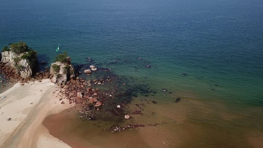 Aerial view of Kemasik beach during sunny day. This footage was capture thru drone.