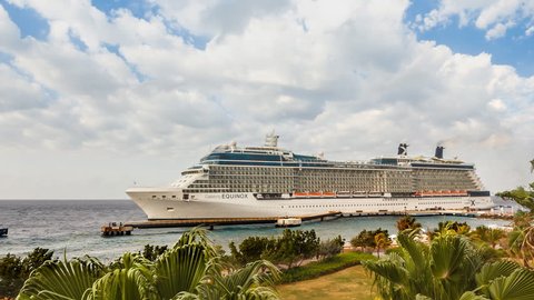 WILLEMSTAD, CURACAO - APRIL 11, 2018:  Time lapse of cruise ship Celebrity Equinox arriving to port Willemstad. The island is a popular Caribbean cruise destination
