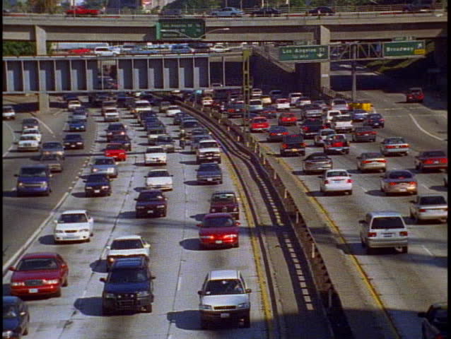 LOS ANGELES, 1999, Freeway traffic Los Angeles Royalty-Free Stock Footage #1011654737