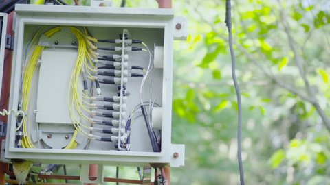 Telephone transmitter connection system at cellular phone antennas in rural areas.Telecom network base station.Telecommunication mast television post.Development communication.Footage 4k