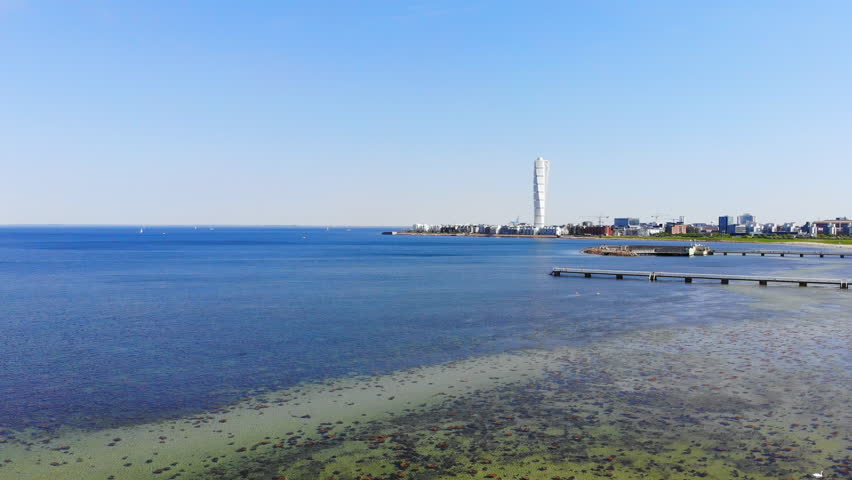 Aerial view of cityscape of Malmo, capital city of Scania, skyline of modern downtown, seascape of Baltic Sea and Ribersborg Beach area - landscape of Sweden from above, Scandinavia, Europe