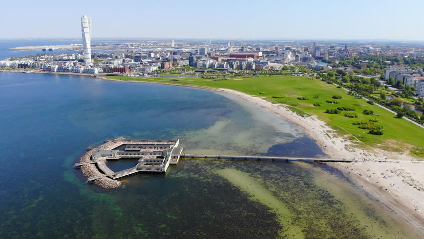 Aerial view of cityscape of Malmo, capital city of Scania, skyline of modern downtown, seascape of Baltic Sea and Ribersborg Beach area - landscape of Sweden from above, Scandinavia, Europe