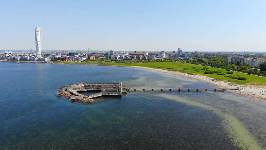 Aerial view of cityscape of Malmo, capital city of Scania, skyline of modern downtown, seascape of Baltic Sea and Ribersborg Beach area - landscape of Sweden from above, Scandinavia, Europe