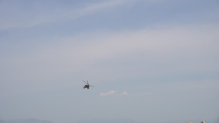 Fighter Helicopter, flying at high altitude,