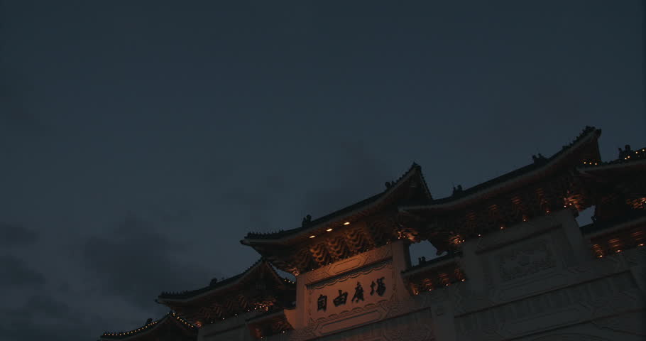 Cloud moving above Arch of the Liberty Square. The Archway inscribed with the characters “Liberty Square”