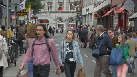 Dublin, Ireland - May, 2016: People walking on Suffolk Street in Dublin