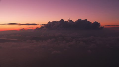 Oahu, Hawaii circa-2018. Aerial timelapse of clouds at sunset . 