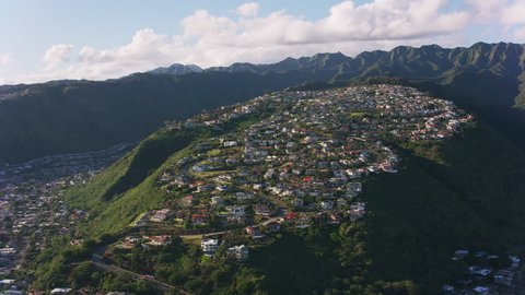 Oahu, Hawaii circa-2018. Aerial view of homes built along ridge on south shore of Oahu. Shot with Cineflex and RED Epic-W Helium.