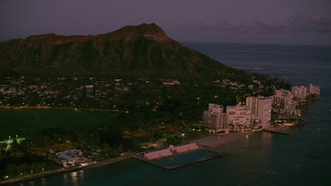 Honolulu, Oahu, Hawaii circa-2018. Aerial view of Diamond Head at sunset. Shot with Cineflex and RED Epic-W Helium.