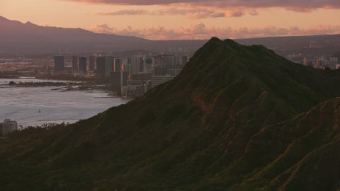 Honolulu, Oahu, Hawaii circa-2018. Aerial view of Waikiki and Diamond Head at sunset. Shot with Cineflex and RED Epic-W Helium.