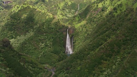 Kauai, Hawaii circa-2018, Aerial view of Manawaiopuna Falls also known as Jurassic Falls. Shot with Cineflex and RED Epic-W Helium.