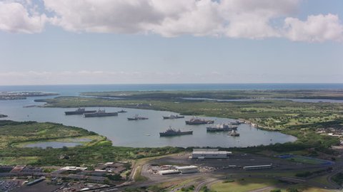 Oahu, Hawaii circa-2018. Aerial view of ships in Pearl Harbor. Shot with Cineflex and RED Epic-W Helium.