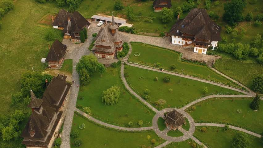 Aerial view over Barsana Monastery, Maramures - Romania. Wooden church UNESCO world heritage site