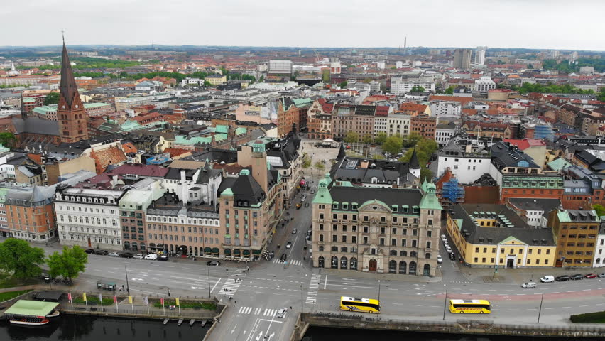 Aerial view of cityscape of Malmo, capital city of Scania, historic center of city, brightly colored houses, Stortorget Square - landscape of Sweden from above, Scandinavia, Europe, 4k UHD