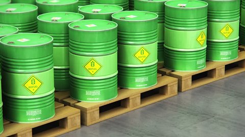 3D render illustration of the group of green stacked metal biofuel drums or biodiesel barrels in the industrial storage warehouse with selective focus effect
