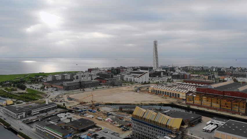 Aerial view of cityscape of Malmo, capital city of Scania, skyline of modern downtown, city canals - landscape of Sweden from above, Scandinavia, Europe, 4k UHD