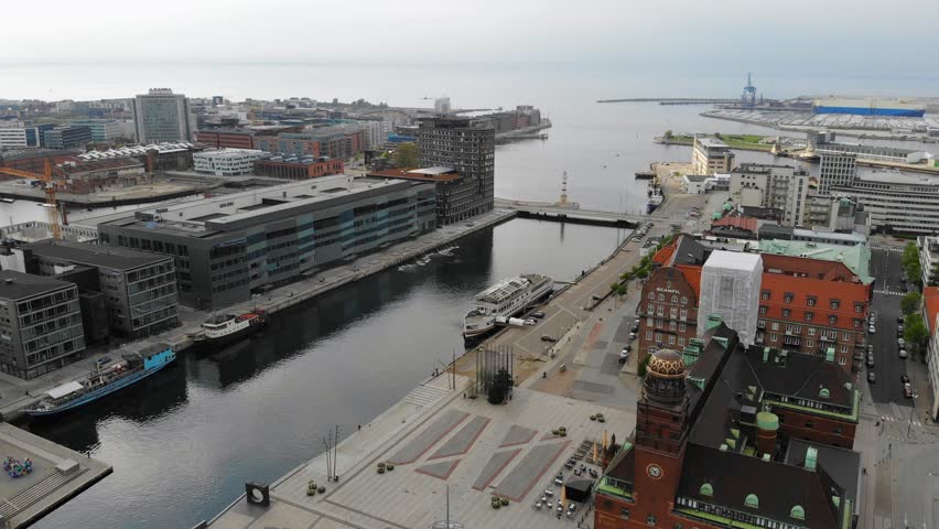 Aerial view of cityscape of Malmo, capital city of Scania, skyline of modern downtown, city canals - landscape of Sweden from above, Scandinavia, Europe, 4k UHD