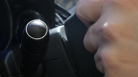 Manually changing car headlights modes on handle 4K video