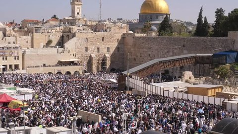 Jerusalem, Israel - 2020 View of alote people praying front the Western wall in the old city of Jerusalem. The Wailing Wall - Day of Jerusalem, Yom Kippur, Sukkot, holy, cityscape, kotel,