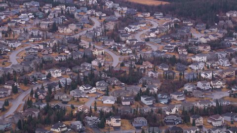 Anchorage, Alaska circa-2018. Aerial view of homes in Anchorage, Alaska. Shot from helicopter with Cineflex gimbal and RED Epic-W camera.