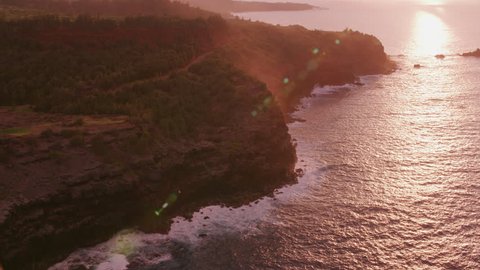 Molokai, Hawaii circa-2018. Aerial view of sunset over Molokai coastline . Shot with Cineflex and RED Epic-W Helium.