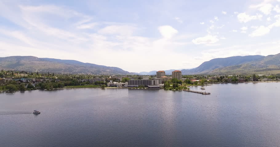 Slow Reveal Shot of Center of Small Canadian Town from the Lake Front