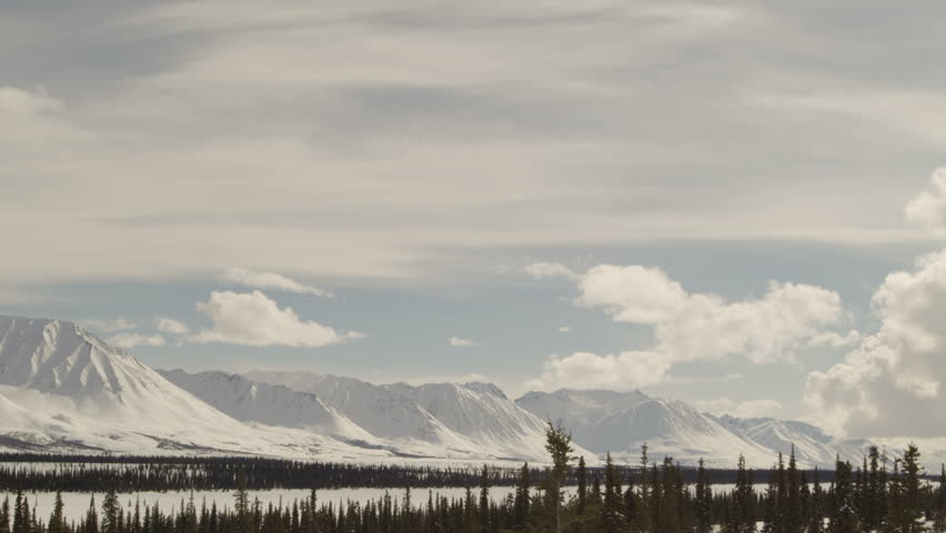 Mountain range in Alaska and rapidly changing weather conditions during winter