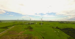 Rio Grande do Sul, Brazil 2018: Aerial panorama of a wind farm. Spining camera revealing wind turbines. Wind turbines in wind farm aerial shot. Clean energy.