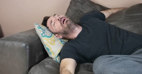 sleeping guy falling from couch