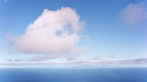 Oahu, Hawaii circa-2018, Aerial view of clouds over Pacific Ocean off the coast of Hawaii. Shot with Cineflex and RED Epic-W Helium.