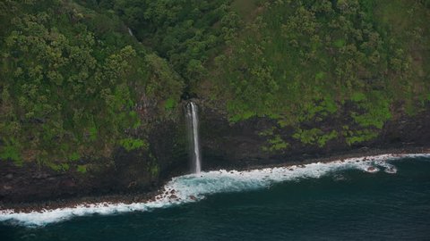 Maui, Hawaii circa-2018. Aerial view of waterfalls along Maui coastline. Shot with Cineflex and RED Epic-W Helium.