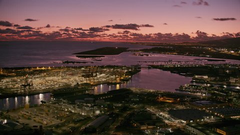 Honolulu, Oahu, Hawaii circa-2018. Aerial view of Honolulu Harbor at dusk. Shot with Cineflex and RED Epic-W Helium.